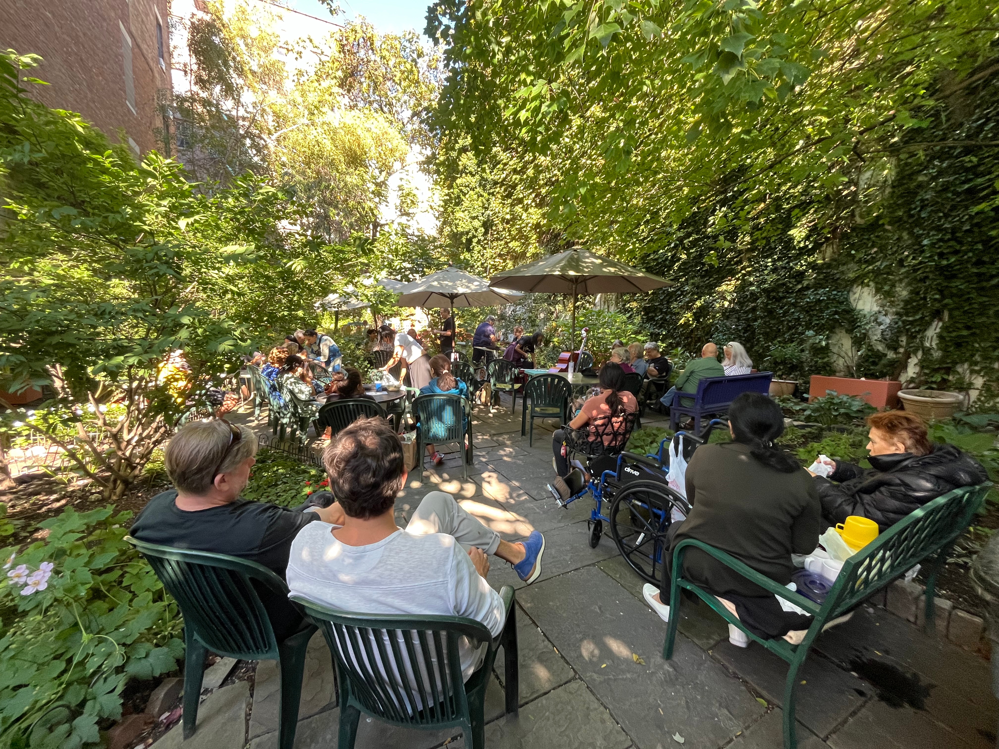 Visitors enjoying a live jazz concert in the Garden. 